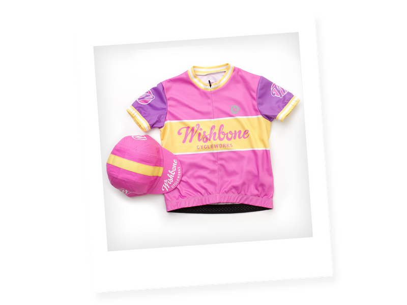 Pink childs cycling cap and top